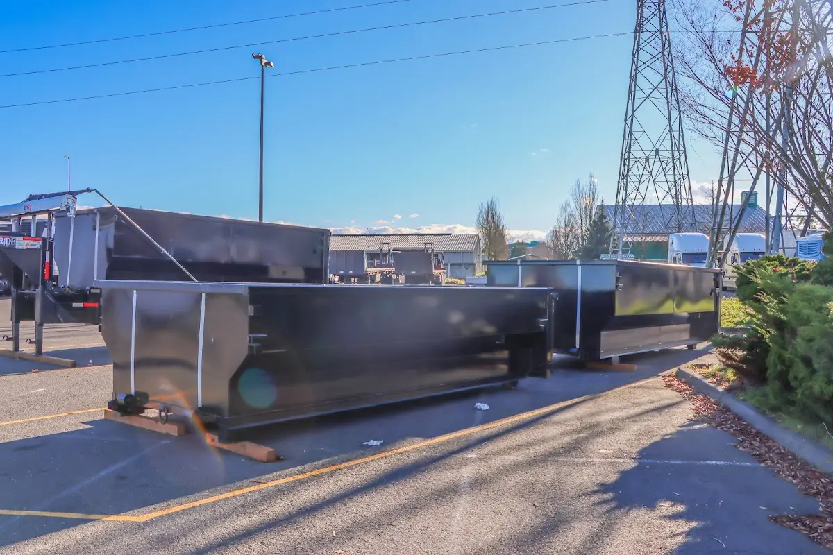 Roll-off dumpster ready for waste disposal at job site for 12 Yard Dumpster Rental in West Salem